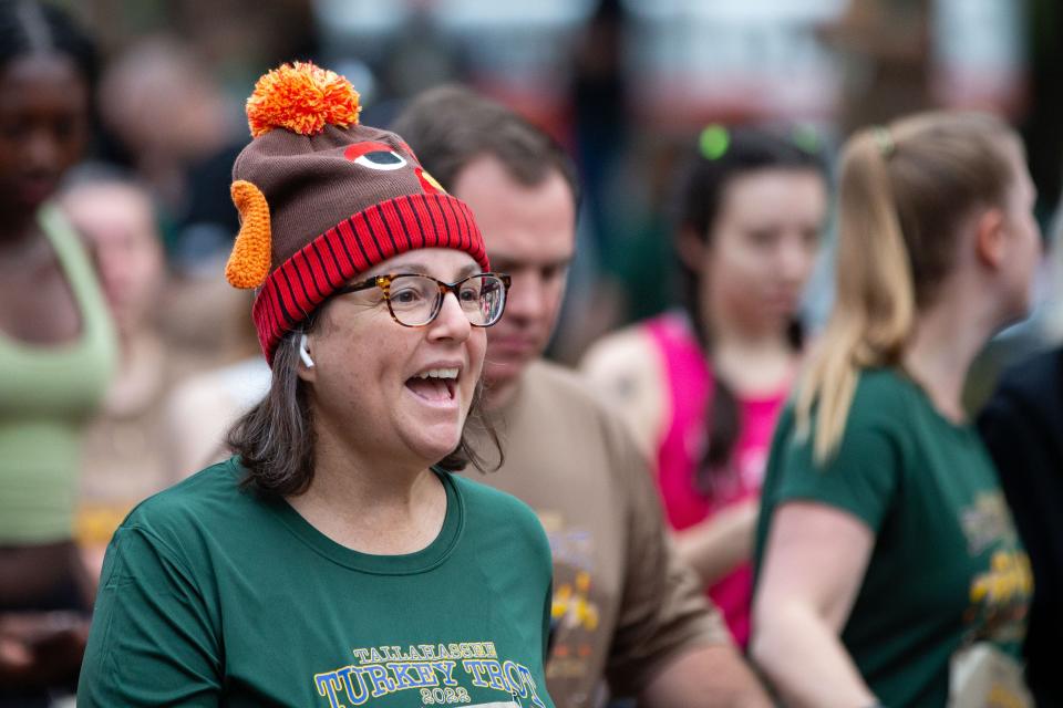 Families, friends and dogs trotted their way to the finish line during the Tallahassee Turkey Trot on Thanksgiving morning Thursday, Nov. 24, 2022.