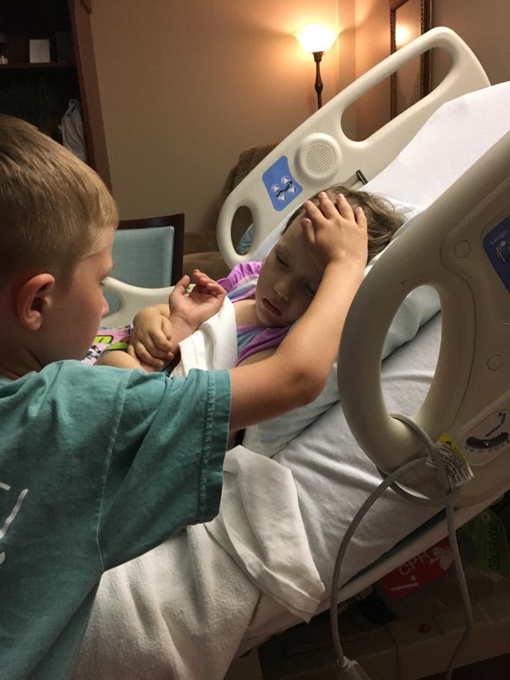 A photo of a boy by the bedside of his dying 4-year-old sister is going viral. (Photo: Hope for Addy Joy – Fighting DIPG via Facebook)