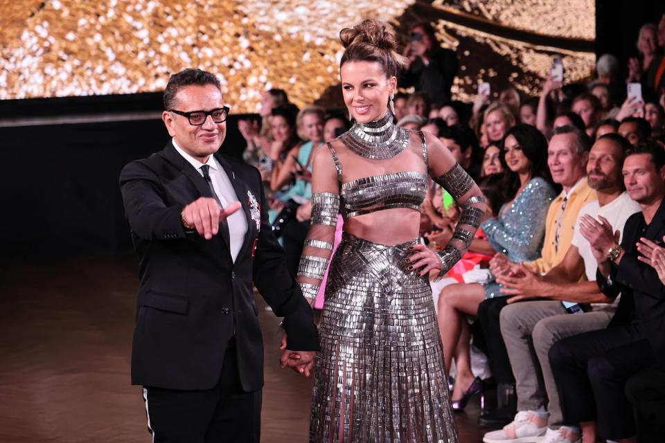 Designer Naeem Khan and Kate Beckinsale walk the runway at the Naeem Khan fashion show during September 2022 New York Fashion Week: The Shows at Sony Hall on September 09, 2022 in New York City.