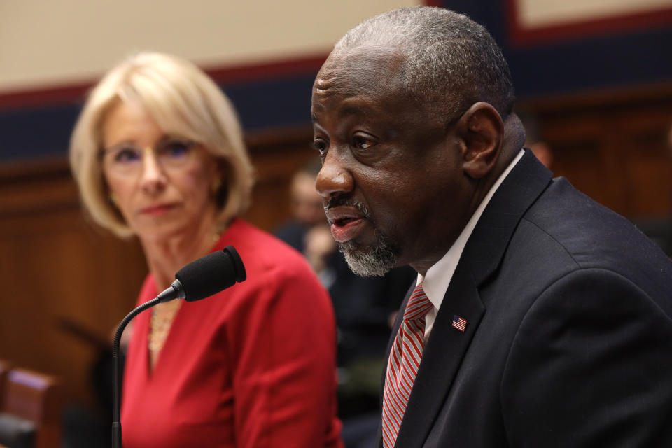 Betsy DeVos, who at the time was secretary of education, listens as Mark Brown, the head of the Federal Student Aid office, speaks during a hearing before the House Education and Labor Committee on Dec. 12, 2019.  (Photo: Alex Wong via Getty Images)