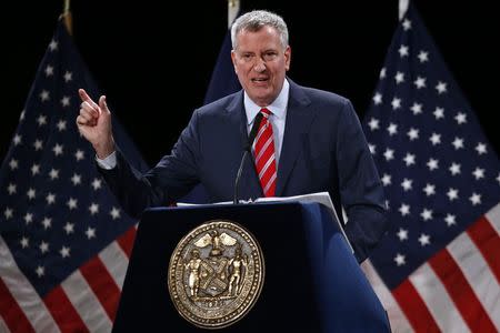 New York City Mayor Bill de Blasio delivers his State of the City address at Baruch College in the Manhattan borough of New York City, February 3, 2015. REUTERS/Mike Segar