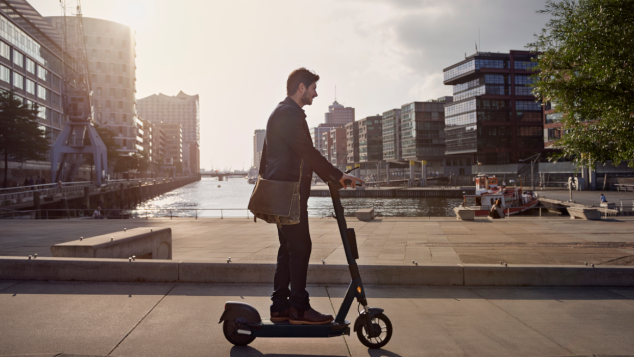  Man riding on an electric scooter 