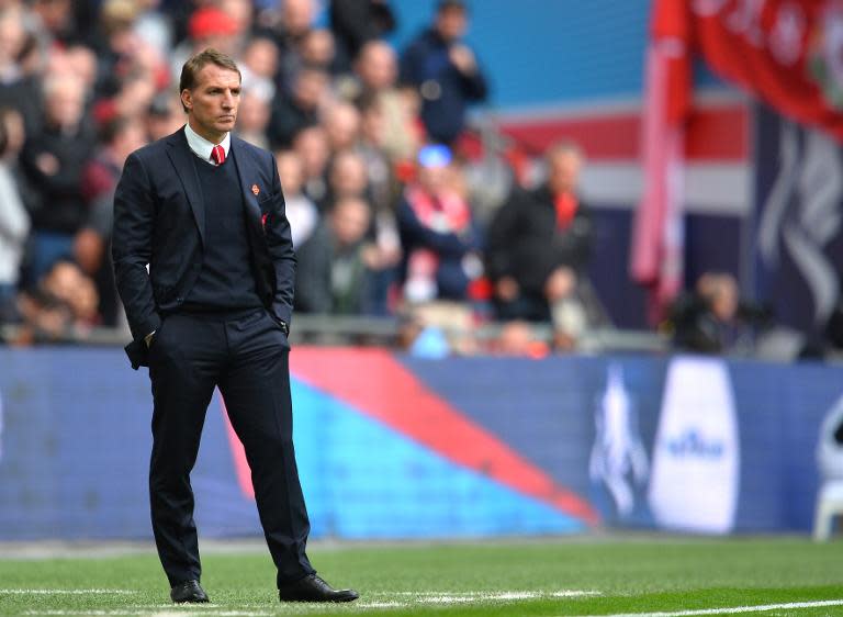 Liverpool's Northern Irish manager Brendan Rodgers looks on during the FA Cup semi-final between Aston Villa and Liverpool at Wembley stadium in London on April 19, 2015