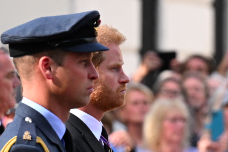 The Prince of Wales and Prince Harry were watched by thousands of people who had lined the procession route. (Reuters)