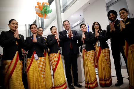 Transportation and Intelligence Minister Yisrael Katz (C) poses for a picture during a ceremony marking the arrival of an Air India Boeing 787 plane at Ben Gurion International Airport in Lod, near Tel Aviv, Israel, March 22, 2018. REUTERS/Amir Cohen