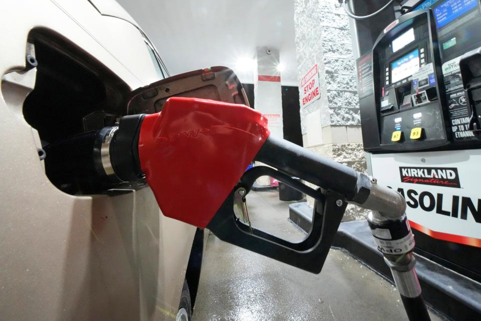 Gas is pumped at a Costco Warehouse in Cranberry, Pa.