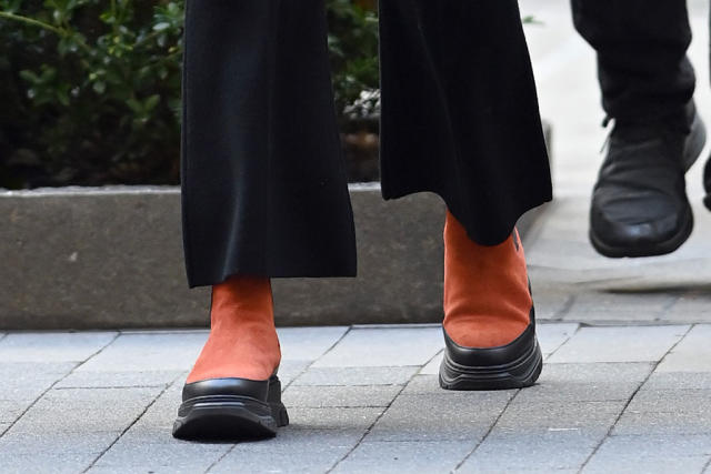 Selena Gomez Does Smart Color-Coordinating in Orange Chelsea Boots
