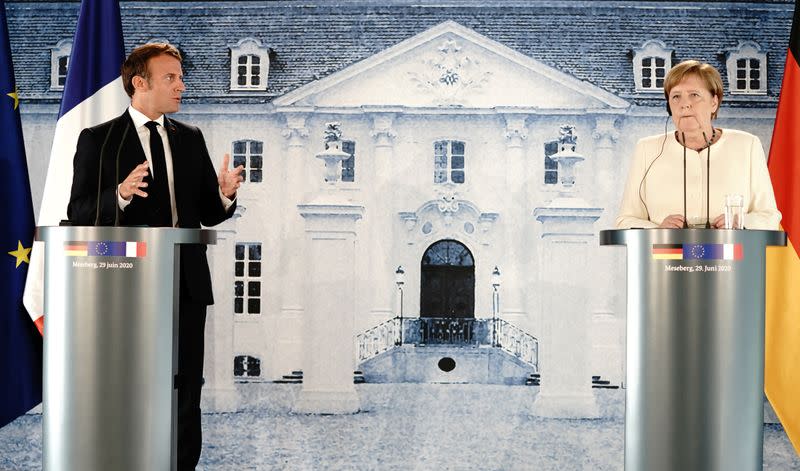 German Chancellor Angela Merkel and French President Emmanuel Macron meet at Meseberg castle