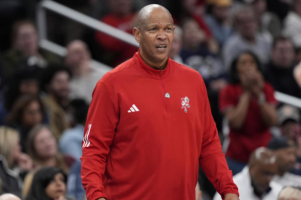 Louisville head coach Kenny Payne reacting in the closing minutes of the second half of the Atlantic Coast Conference NCAA college basketball tournament game against the North Carolina State, Tuesday, March 12, 2024, in Washington. (AP Photo/Susan Walsh)
