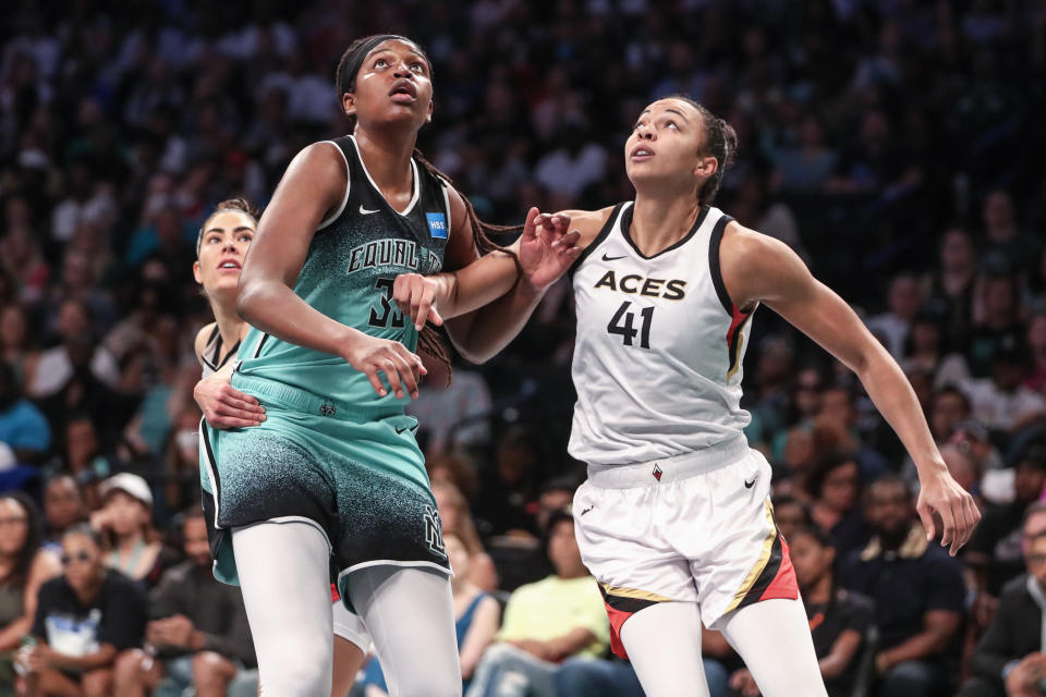New York Liberty forward Jonquel Jones and Las Vegas Aces center Kiah Stokes box out for a rebound in the first quarter at Barclays Center in New York on Aug. 6, 2023. (Wendell Cruz/USA TODAY Sports)