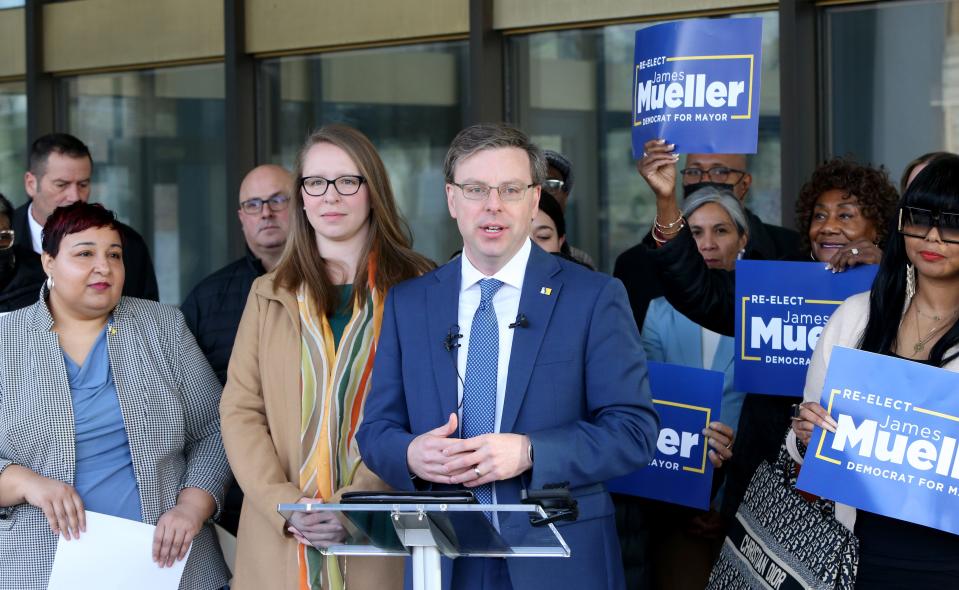 South Bend Mayor James Mueller announces his candidacy to run for a second term as mayor of South Bend Wednesday, Jan. 11, 2023, outside the County-City Building in South Bend before he filed the paperwork with the county clerk.