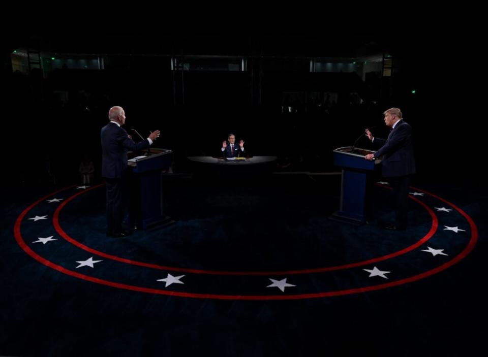 US President Donald Trump (R) and former Vice President and Democratic presidential nominee Joe Biden participate in the first presidential debate at the Health Education Campus of Case Western Reserve University on September 29, 2020 in Cleveland, Ohio. (Photo by Olivier Douliery-Pool/Getty Images)