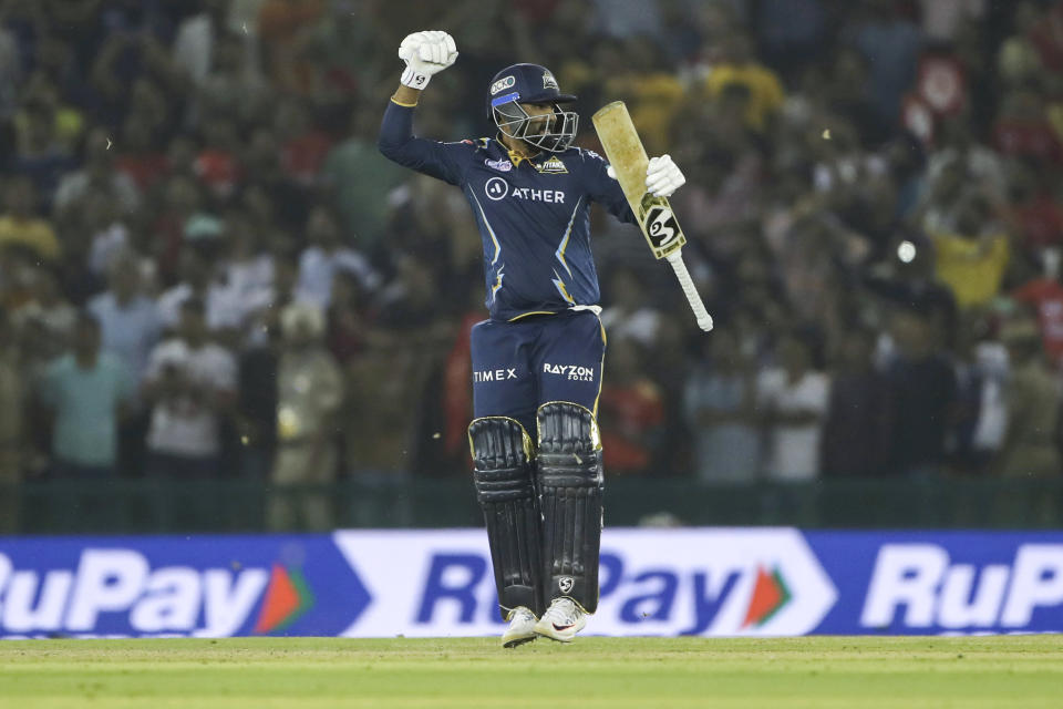 Rahul Tewatia of Gujarat Titans celebrates after winning the Indian Premier League cricket match between Punjab Kings and Gujarat Titans in Mohali, India, Thursday, April 13, 2023. (AP Photo/ Surjeet Yadav)