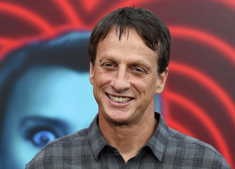 FILE - In this July 25, 2018 file photo, skateboarding legend Tony Hawk arrives at the world premiere of "The Spy Who Dumped Me" in Los Angeles. Hawk is among several inductees for the next class of the California Hall of Fame. Gov. Gavin Newsom and first partner Jennifer Siebel Newsom announced the inductees on Wednesday, Nov. 13, 2019. (Photo by Jordan Strauss/Invision/AP, File)