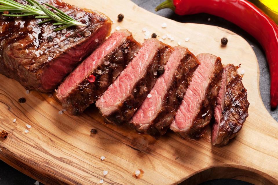 <p>Lean beef is one of the best-absorbed sources of <a href="https://www.prevention.com/food-nutrition/healthy-eating/g20465791/8-foods-that-have-more-iron-than-beef/" rel="nofollow noopener" target="_blank" data-ylk="slk:iron;elm:context_link;itc:0;sec:content-canvas" class="link ">iron</a> there is. (Too-little iron can cause <a href="https://www.prevention.com/health/a20500940/could-you-be-anemic-7-things-you-need-to-know/" rel="nofollow noopener" target="_blank" data-ylk="slk:anemia;elm:context_link;itc:0;sec:content-canvas" class="link ">anemia</a>.) Adding as little as one ounce of beef per day can make a big difference in the body’s ability to absorb iron from other sources, says Mary J. Kretsch, PhD, a researcher at the USDA-ARS Western Human Nutrition Research Center in Davis, CA. </p><p>Beef also packs plenty of <a href="https://www.prevention.com/food-nutrition/g20734052/zinc-deficiency-symptoms/" rel="nofollow noopener" target="_blank" data-ylk="slk:zinc;elm:context_link;itc:0;sec:content-canvas" class="link ">zinc</a> and B vitamins, which help your body convert food into energy. If you can, splurge on grass-fed beef. Compared with grain-fed beef, it has twice the concentration of vitamin E, a powerful brain-boosting antioxidant. It’s also high in omega-3 fatty acids. </p><p><strong>Try it: </strong><a href="https://www.prevention.com/food-nutrition/recipes/a25703592/sheet-pan-steak-veggies-recipe/" rel="nofollow noopener" target="_blank" data-ylk="slk:Sheet Pan Steak With Beans and Broccolini;elm:context_link;itc:0;sec:content-canvas" class="link ">Sheet Pan Steak With Beans and Broccolini</a></p>