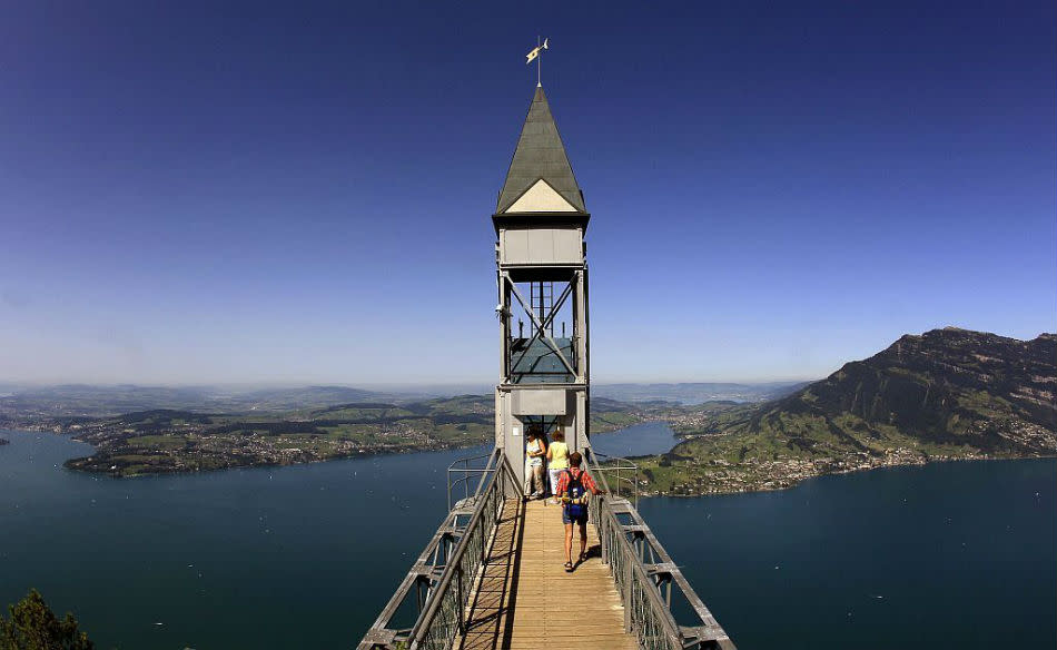 People leave the Hammetschwand Lift, Europe's highest exterior elevator, to reach the lookout point Hammetschwand at the Bürgenstock plateau overlooking Lake Lucerne.