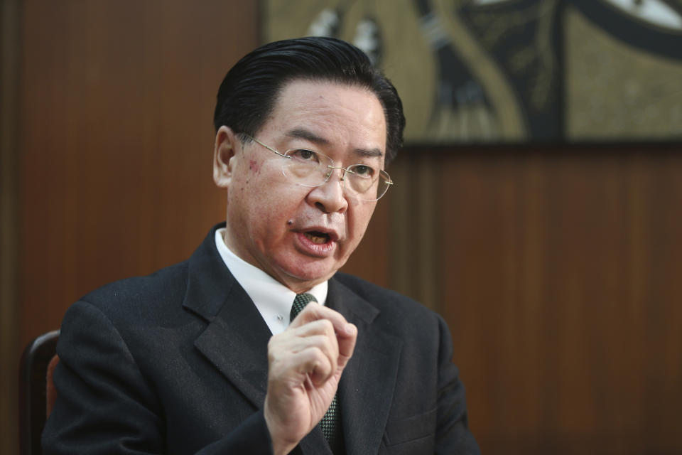 Taiwanese Foreign Minister Joseph Wu speaks during an exclusive interview with The Associated Press at his ministry in Taipei, Taiwan, Tuesday, Dec. 10, 2019. Wu was careful to say his government has no desire to intervene in Hong Kong’s internal affairs, and that existing legislation is sufficient to deal with a relatively small number of Hong Kong students or others who seek to reside in Taiwan. (AP Photo/Chiang Ying-ying)