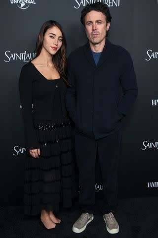 <p>Alberto Rodriguez/WWD via Getty</p> Caylee Cowan and Casey Affleck