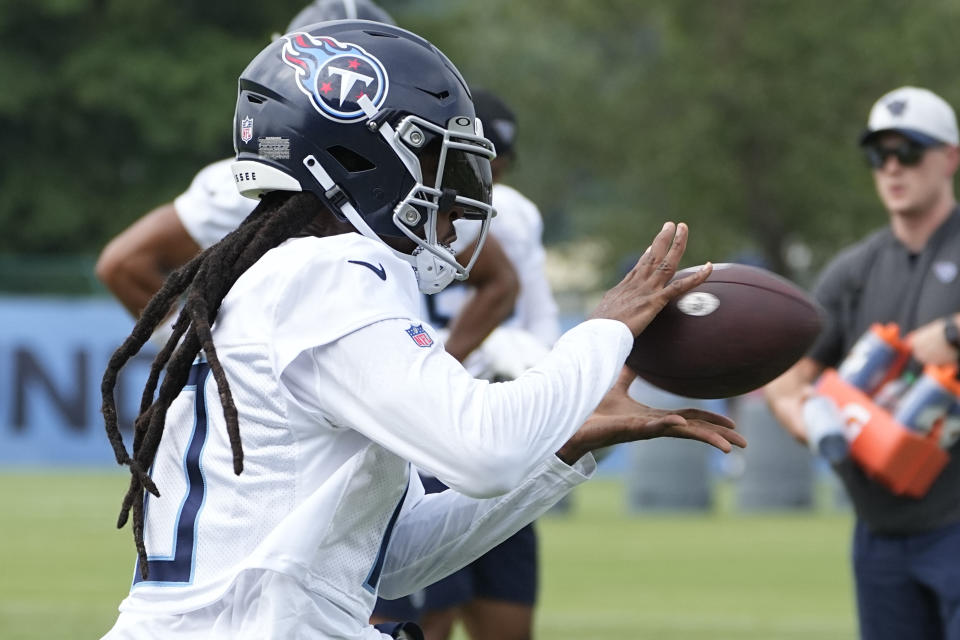 Tennessee Titans wide receiver DeAndre Hopkins pulls in a catch during an NFL football training camp practice Wednesday, July 26, 2023, in Nashville, Tenn. (AP Photo/George Walker IV)