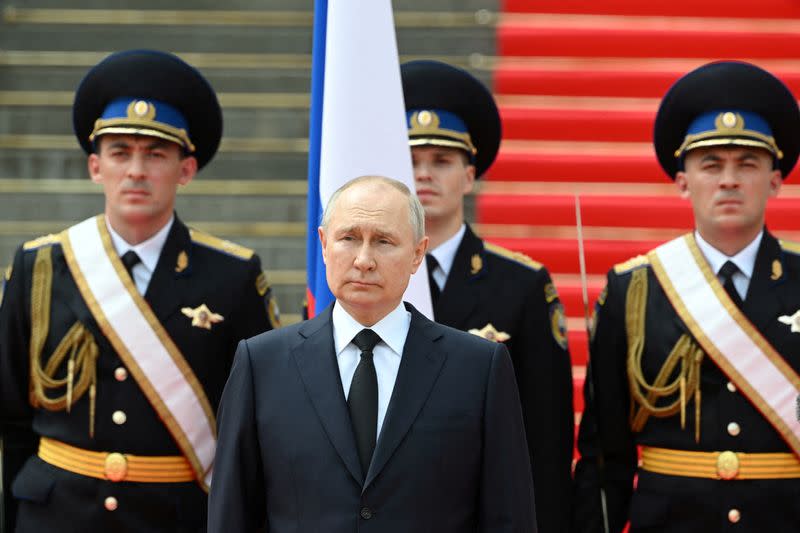 FILE PHOTO: Russian President Putin addresses service members in Moscow