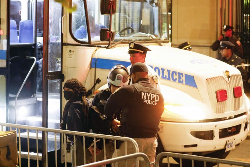 NYPD police officers remove and arrest dozens of Pro-Palestine protesters who occupied the Hamilton Hall building at Columbia University in New York City. NYPD said they moved onto campus Tuesday night at the request of Columbia University administrators. Photo by John Angelillo/UPI