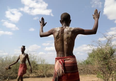 The Wider Image: When raiders menace in northern Kenya, grab your guns