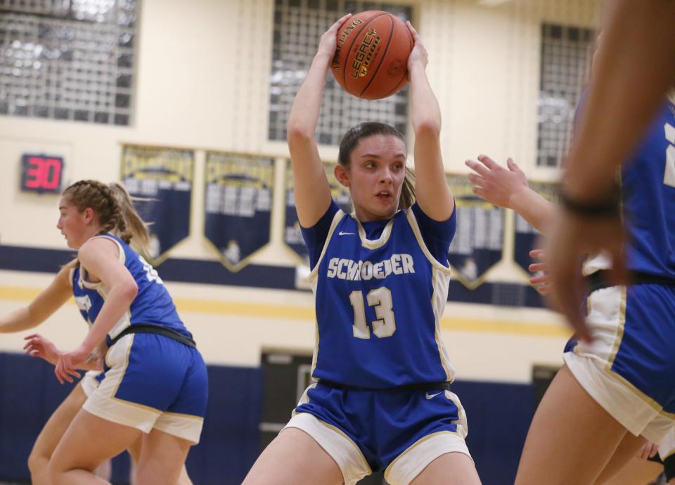 Schroeder's Ava Gallup grabs a rebound on a Sutherland foul shot.