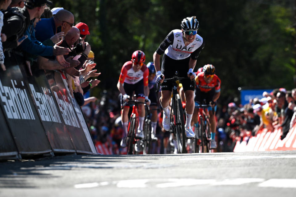 HUY BELGIUM  APRIL 19 Tadej Pogaar of Slovenia and UAE Team Emirates sprint at finish line to win the 87th La Fleche Wallonne 2023 Mens Elite a 1943km one day race from Herve to Mur de Huy  UCIWT  on April 19 2023 in Huy Belgium Photo by David StockmanGetty Images