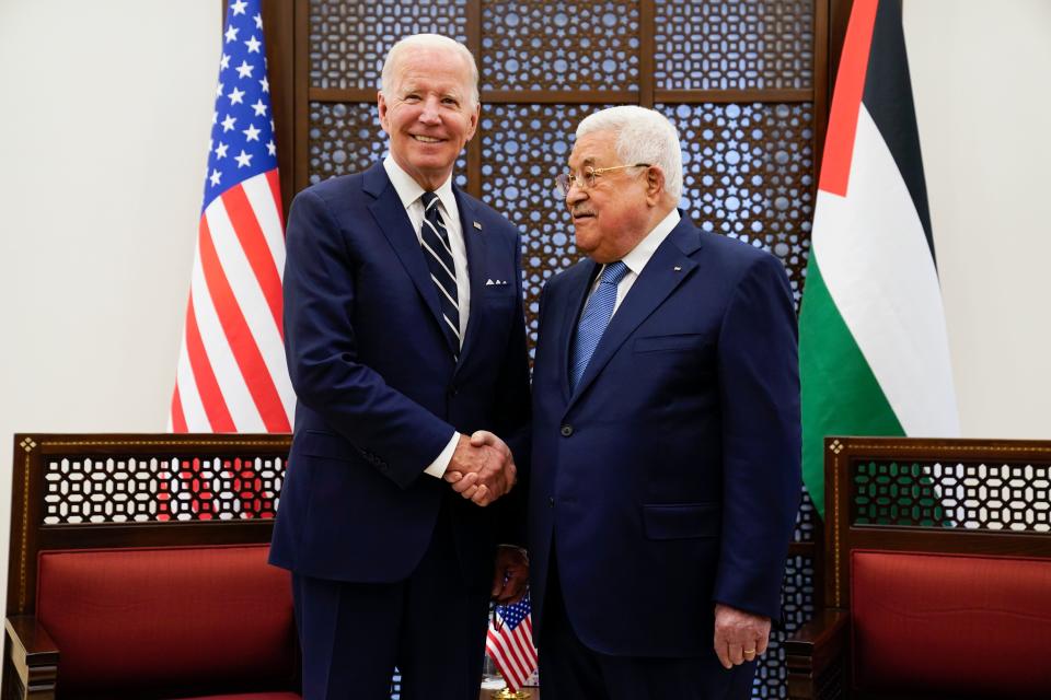 Palestinian President Mahmoud Abbas and U.S. President Joe Biden shake hands in the West Bank town of Bethlehem, Friday, July 15, 2022. (AP Photo/Evan Vucci)