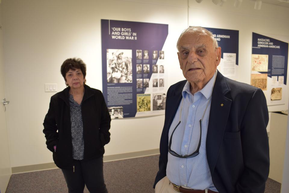 Camille Gregorian, vice president of the board of the Armenian Historical Association of Rhode Island, stands next to Varoujan Karentz, the board's founding chair, at the association's museum in Providence.