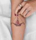<p>This <strong>intricate bow and arrow design</strong> combines color and florals into a super cool Sagittarius <a href="https://www.cosmopolitan.com/style-beauty/beauty/g21273233/best-tattoo-artists-instagram-accounts/" rel="nofollow noopener" target="_blank" data-ylk="slk:tattoo;elm:context_link;itc:0;sec:content-canvas" class="link ">tattoo</a>. So pretty, right?</p><p><a href="https://www.instagram.com/p/B1Tu0GNHkNW/" rel="nofollow noopener" target="_blank" data-ylk="slk:See the original post on Instagram;elm:context_link;itc:0;sec:content-canvas" class="link ">See the original post on Instagram</a></p>