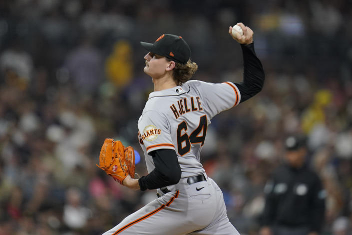 San Francisco Giants relief pitcher Sean Hjelle works against a San Diego Padres batter during the third inning of a baseball game Monday, Oct. 3, 2022, in San Diego. (AP Photo/Gregory Bull)