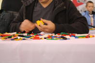 A participant works on his creation.