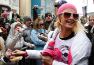 <p>Paris Hilton was in town to promote her new movie, <em>The Hottie & the Nottie</em>, wearing a shirt with her own face on it. Her movie didn’t play at the festival, but all cameras — really old-school cameras! — were fixed on her anyway. (Photo: Frazer Harrison/Getty Images) </p>