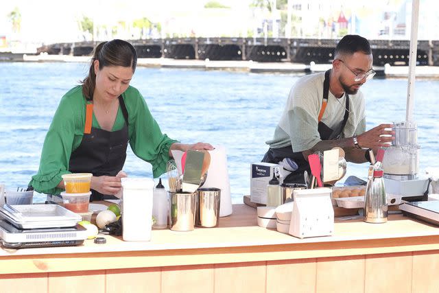 <p>David Moir/Bravo</p> Laura Ozyilmaz and Danny Garcia cook in the 'Top Chef: Wisconsin' final quickfire challenge