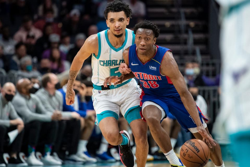 Detroit Pistons guard Saben Lee (38) drives past Charlotte Hornets guard James Bouknight (5) during the second half of an NBA basketball game, Wednesday, Jan. 5, 2022, in Charlotte, N.C. (AP Photo/Matt Kelley)