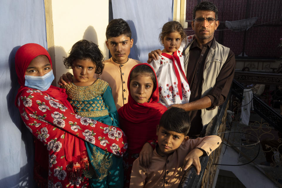 Special Immigrant Visa applicant Ayazudin Hilal with his family 