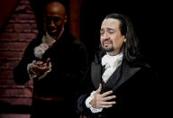 Lin-Manuel Miranda, composer and creator of the award-winning Broadway musical, Hamilton, receives a standing ovation with tears at the ending of the play's premiere held at the Santurce Fine Arts Center, in San Juan, Puerto Rico, Friday, Jan. 11, 2019. The musical is set to run for two weeks and will raise money for local arts programs. (AP Photo/Carlos Giusti)