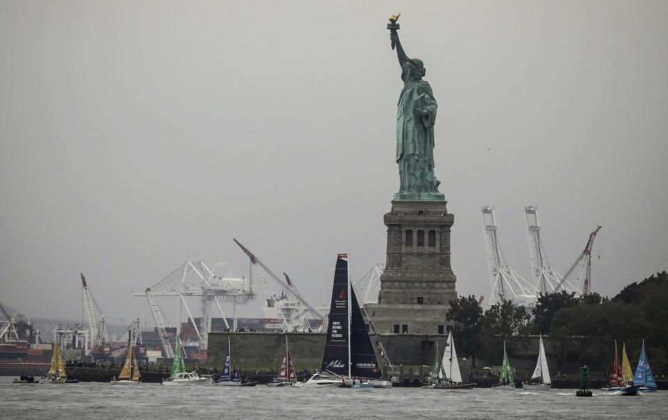 Greta Thunberg, a 16-year-old Swedish climate activist, sails into New York harbor aboard the Malizia II, Wednesday, Aug. 28, 2019. The zero-emissions yacht left Plymouth, England on Aug. 14. She is scheduled to address the United Nations Climate Action Summit on Sept. 23. (AP Photo/Bebeto Matthews)