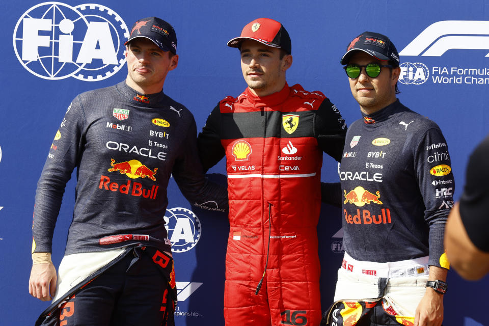 Ferrari driver Charles Leclerc, center, of Monaco, celebrates after clocking the fastest time with second placed Red Bull driver Max Verstappen, left, of the Netherlands, and third placed Red Bull driver Sergio Perez, of Mexico, during the qualifying session for the French Formula One Grand Prix at Paul Ricard racetrack in Le Castellet, southern France, Saturday, July 23, 2022. The French Grand Prix will be held on Sunday. (Eric Gaillard, Pool via AP)