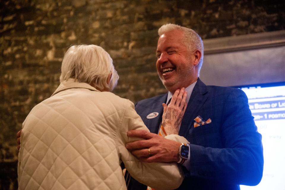 Nathan Bocks celebrates his re-election as mayor with his mother Tuesday, Nov. 7.