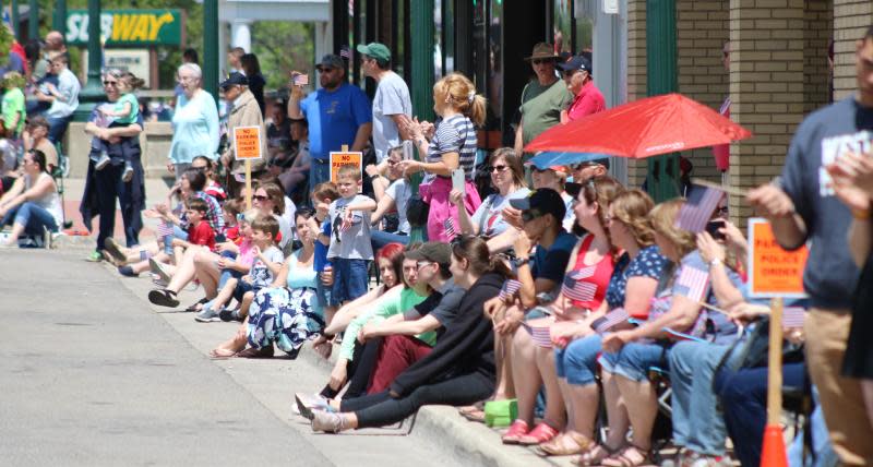 Spectators line the streets to watch a past Memorial Day Parade in downtown Monroe.
At least three Memorial Day Parades will take place this year in the county.