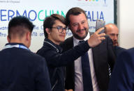 Italian Deputy Premier and Interior Minister Matteo Salvini, center right, poses for a selfie during a ceremony marking the 27th anniversary of the deaths of prosecutors Giovanni Falcone and Paolo Borsellino, in Palermo, Italy, Thursday, May 23, 2019. (Igor Petty/ANSA via AP)