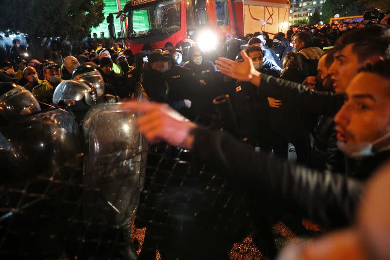 Opposition supporters protest against results of a parliamentary election in Tbilisi