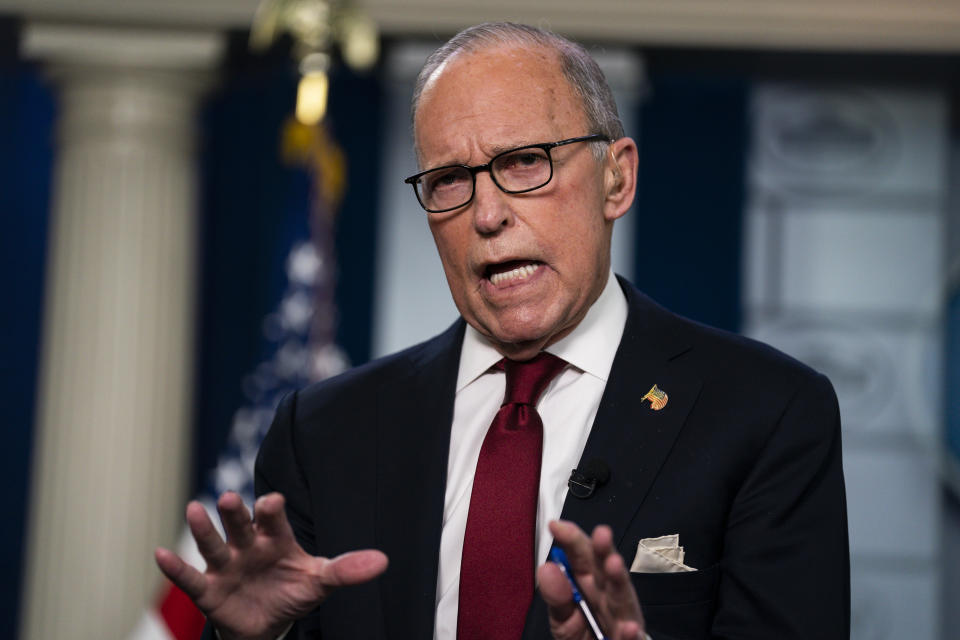 White House chief economic adviser Larry Kudlow talks with reporters about the impact of the Coronavirus on markets in the Brady Press Briefing Room of the White House, Friday, Feb. 28, 2020, in Washington. (AP Photo/Evan Vucci)