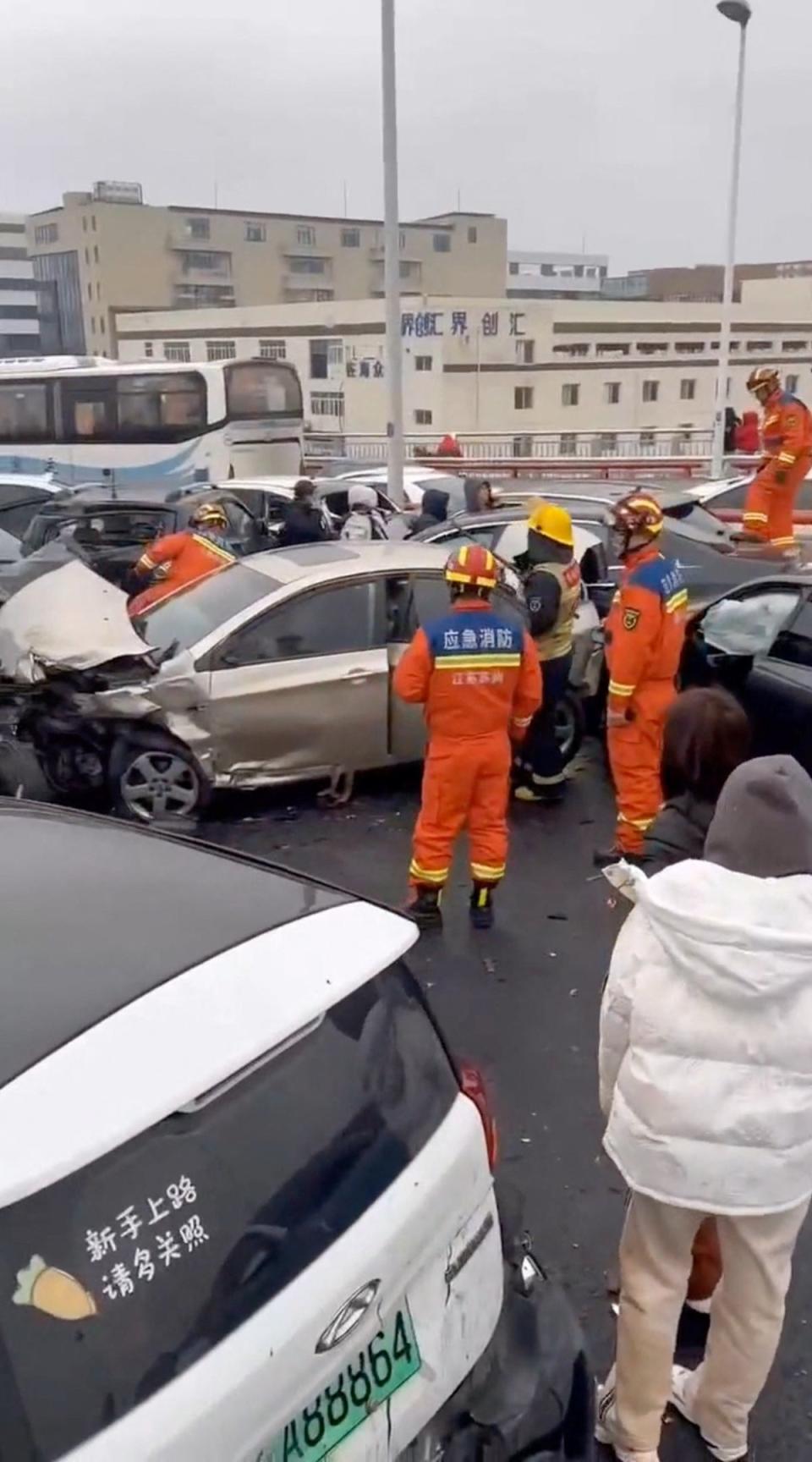 Officers during the clear-up operation (Reuters)