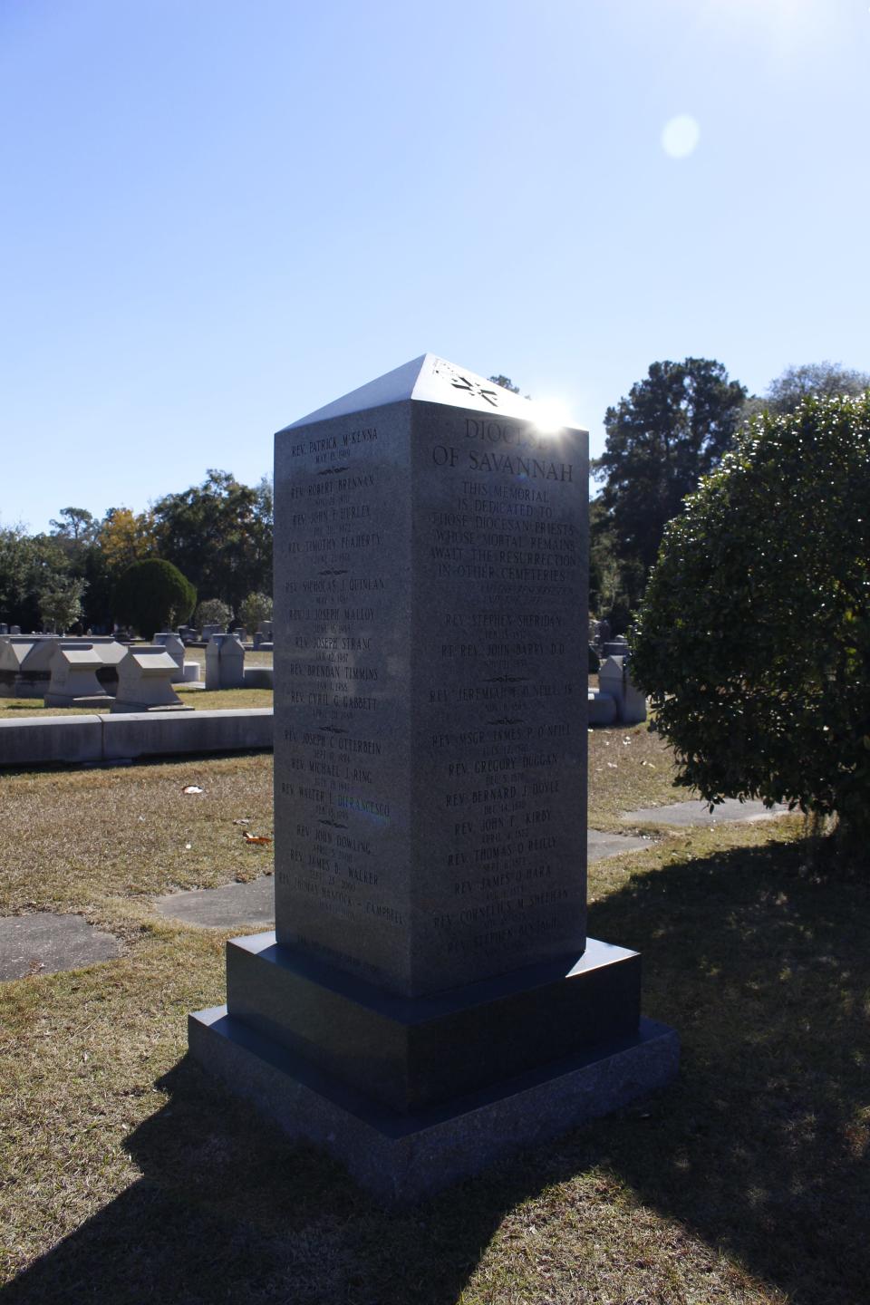 The obelisk in the Catholic Cemetery bears the names of deceased priests and bishops of the Diocese of Savannah buried in other graves.