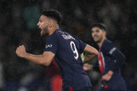 PSG's Goncalo Ramos celebrates after scoring his side's third goal during the French League One soccer match between Paris Saint-Germain and Le Havre at the Parc des Princes in Paris, Saturday, April 27, 2024. (AP Photo/Thibault Camus)