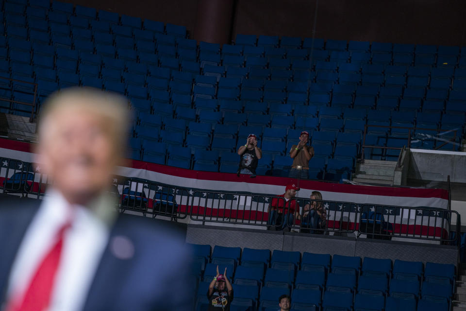 President Donald Trump supporters cheer as Trump speaks during a campaign rally at the BOK Center, Saturday, June 20, 2020, in Tulsa, Okla. (AP Photo/Evan Vucci)