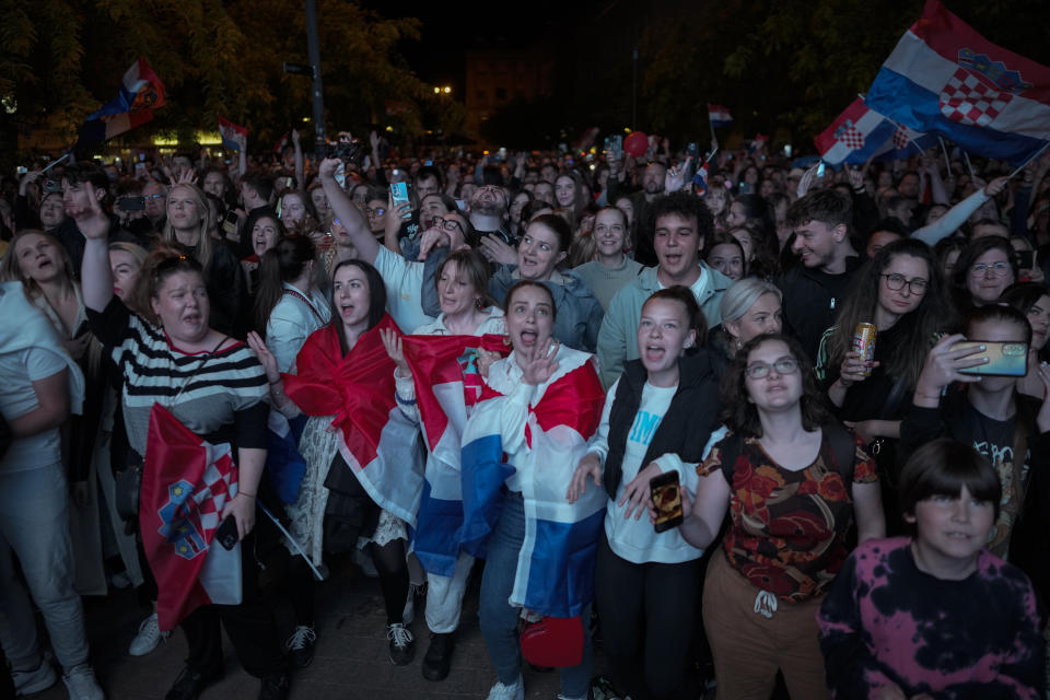 Supporters cheer during a live broadcast of a performance by Croatia's Baby Lasagna at the Eurovision Song Contest in Malmo, Sweden, in Zagreb, Croatia, Saturday, May 11, 2024. (AP Photo/Darko Bandic)
